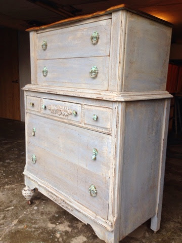 An antique dresser makeover with layers of paint and distressed finish - by Wild Sparrow Designs